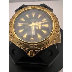 Vintage Invicta  golden tone mechanical, self winding automatic watch